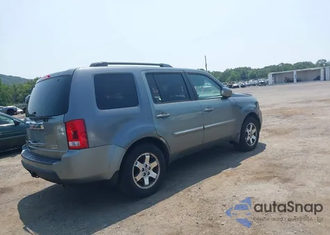 2009 Honda Pilot Touring z USA, uszkodzony, nr VIN 5FNYF48999B020578